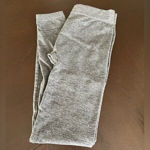 2 grey leggings and 1 black